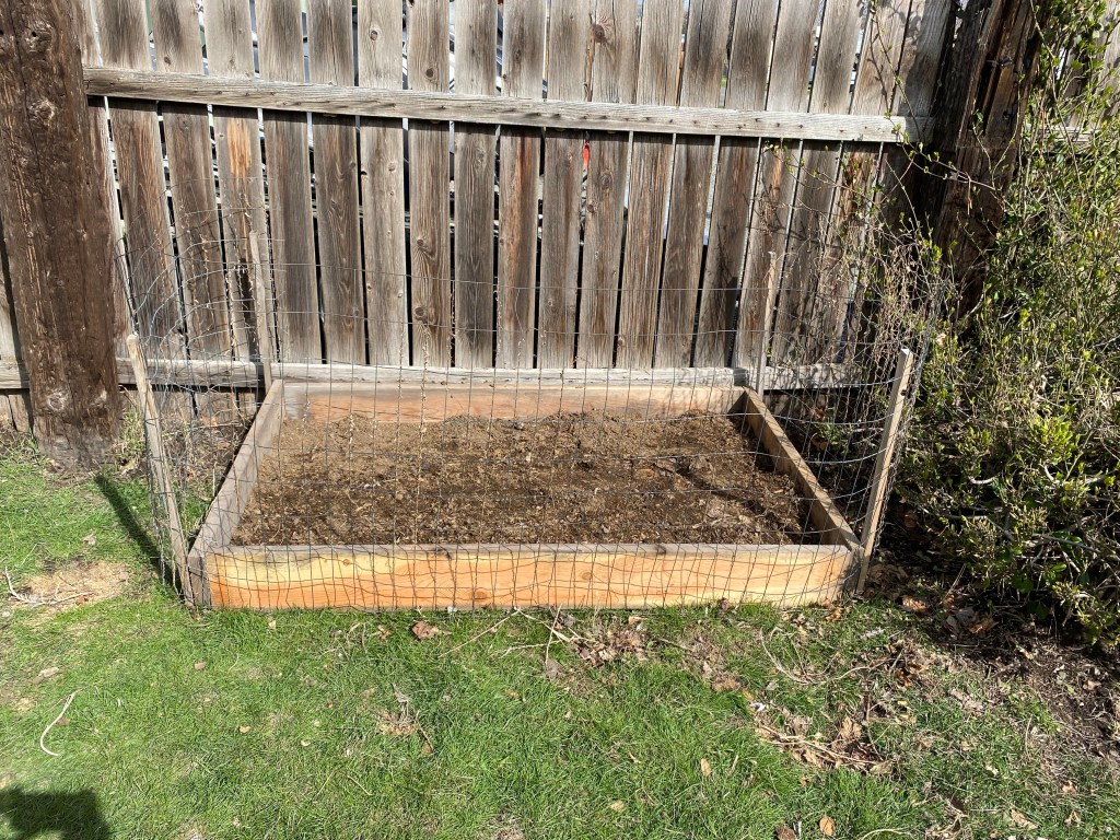 Small diy raised garden bed before planting