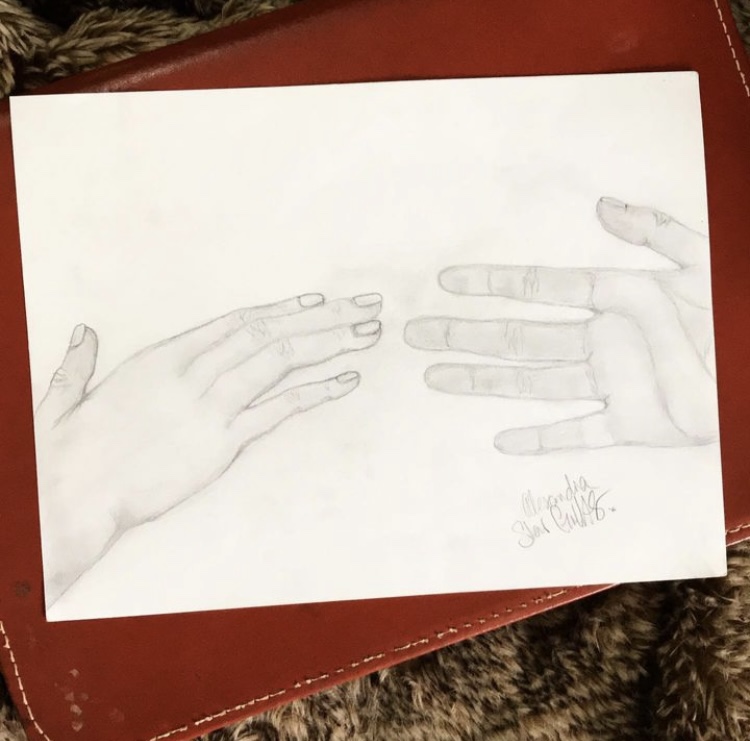 Light pencil sketch of two hands reaching toward each other from the sides of the page