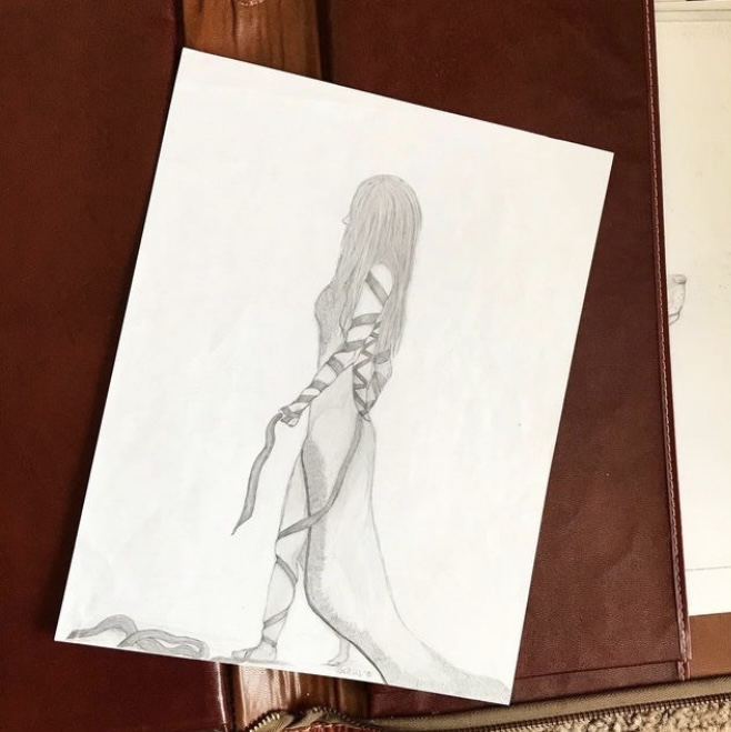 Light pencil sketch of a woman wearing a trailing dress arms and legs wrapped in trailing ribbon