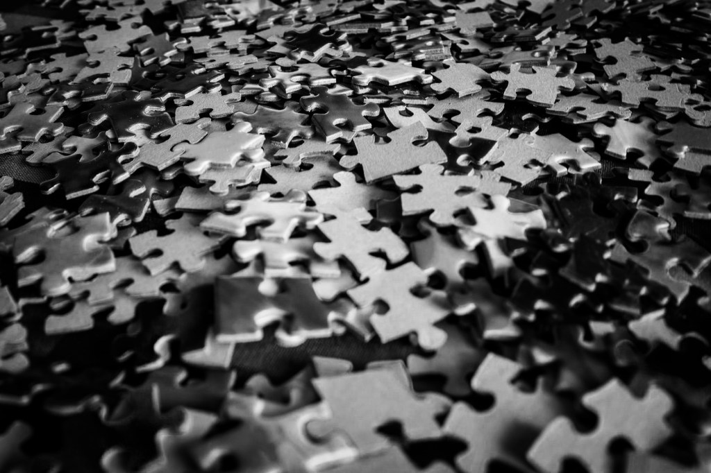A pile of single puzzle pieces