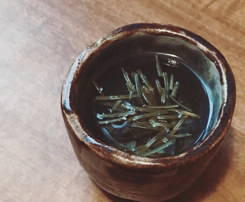 Hand thrown tea cup with pine tea