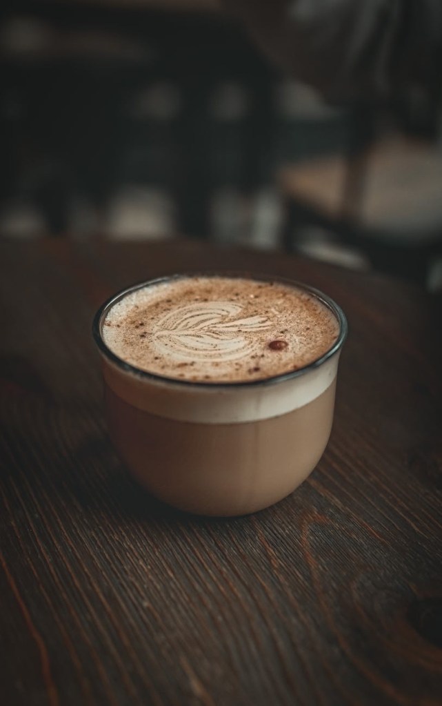 Stoneware coffee mug with a latte 